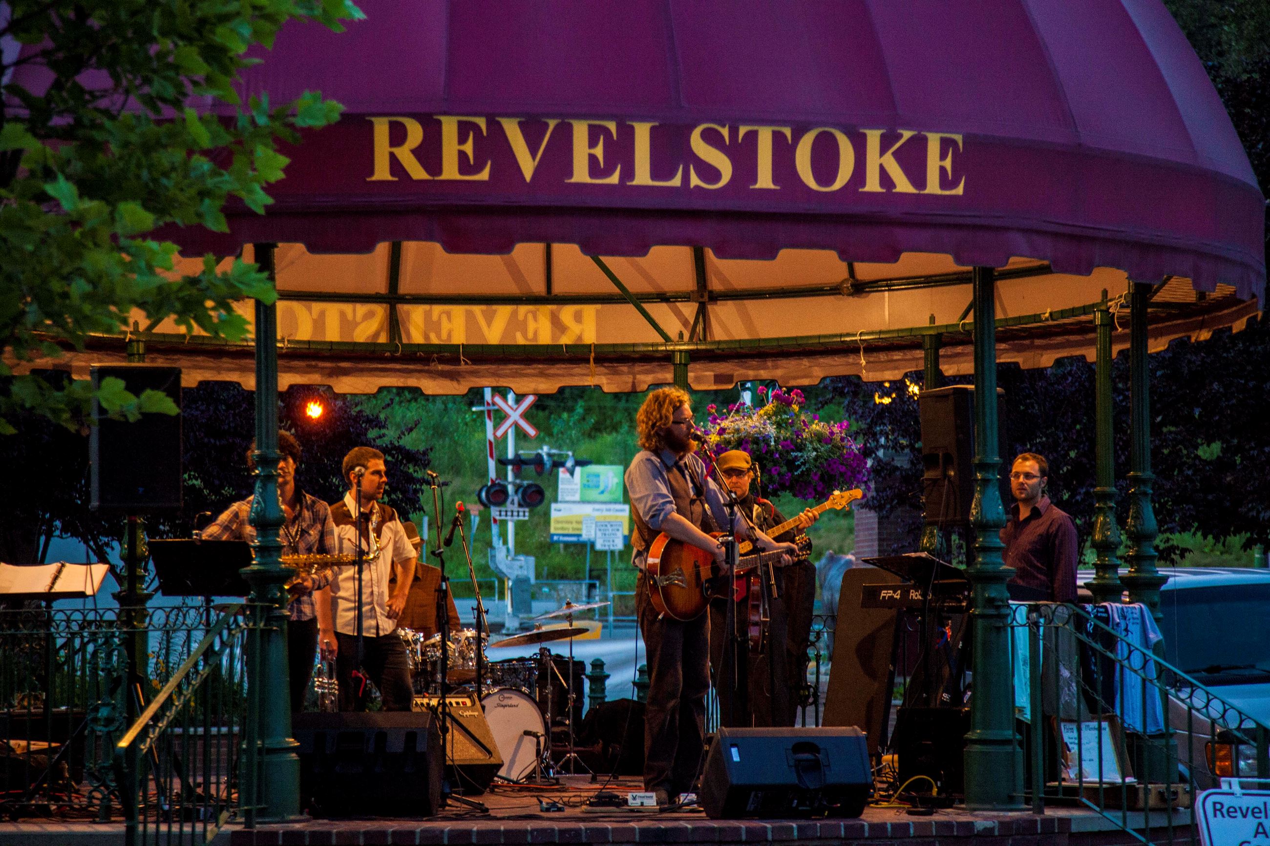 A band playing under a Revelstoke canopy